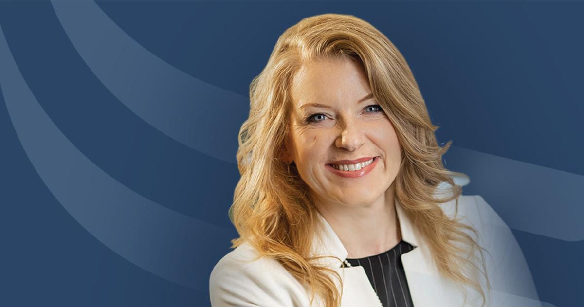 Headshot of Frances Cronlund over a blue Curi RMB Capital themed background