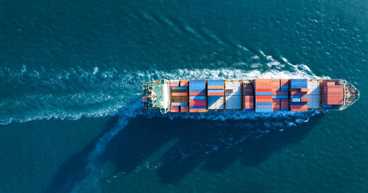 Container ship sailing on ocean
